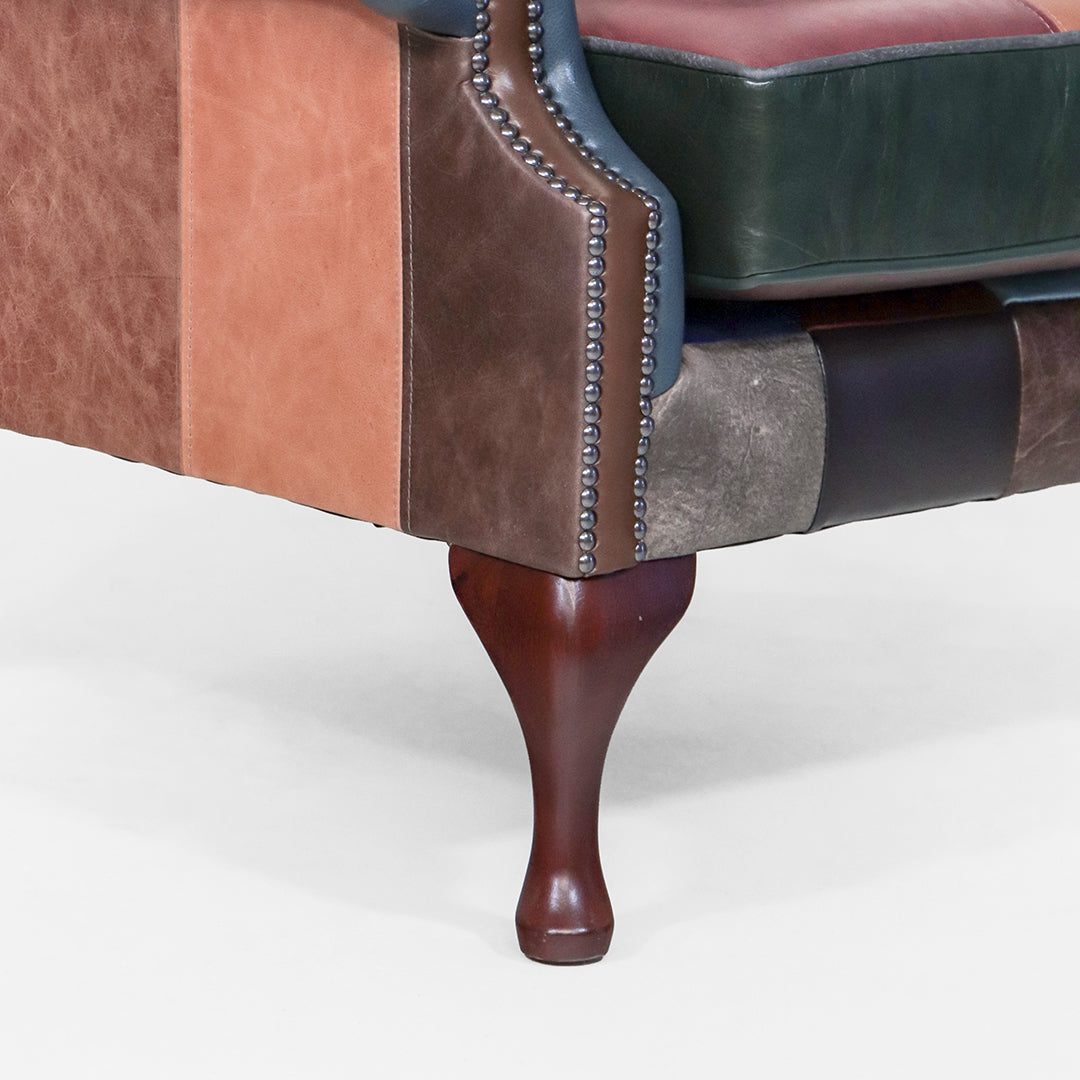 Chesterfield Ohrensessel „Scroll Wing Chair“ aus Patchwork-Leder - Sofort lieferbar