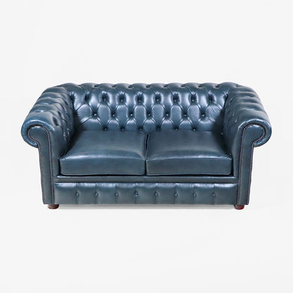 Chesterfield Schlafsofa „Tudor“ – blaues Chesterfield Ledersofa mit Schlaffunktion aus England
