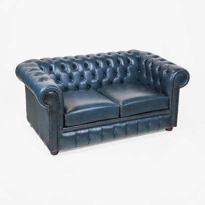Chesterfield Schlafsofa „Tudor“ – blaues Chesterfield Ledersofa mit Schlaffunktion aus England